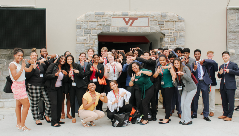 PIP Academy students pose in front of Lane Stadium