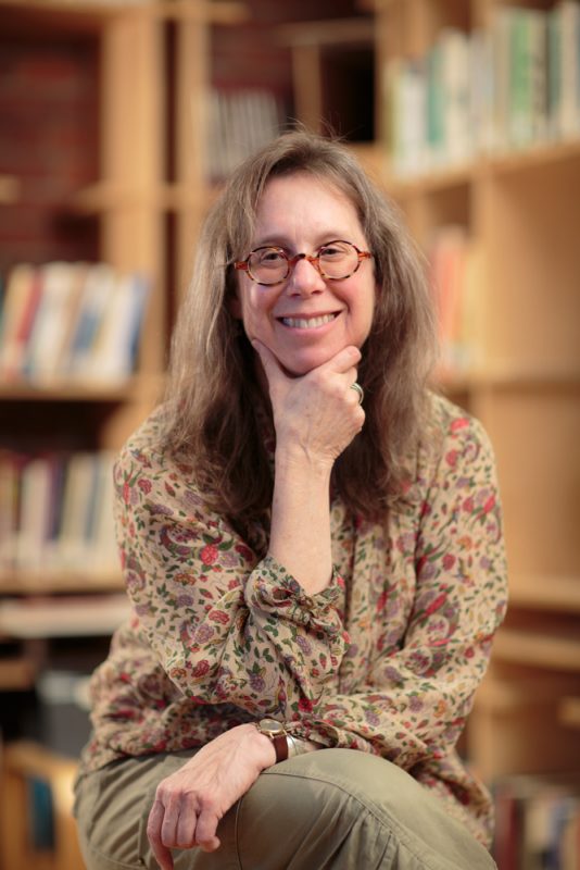 Marcia Feuerstein inside the WAAC library.